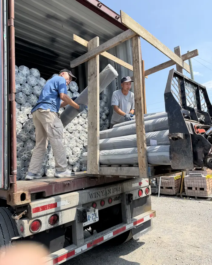 Container of geotextile rolls being unloaded in Toronto